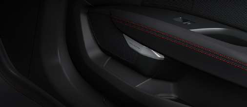 Audi e-tron GT — Ambient interior lighting accenting the door trim and inlay