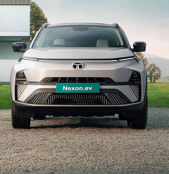 Tata Nexon EV, Full-width smart digital light bar with integrated charging indicator above the closed-off EV fascia