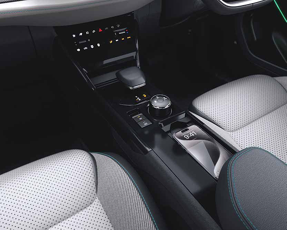 Tata Curvv EV, Wireless smartphone charger next to the smart digital shifter on the console