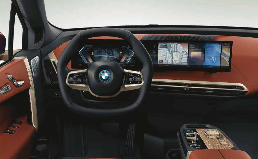 BMW iX — Hexagonal steering wheel and open cabin