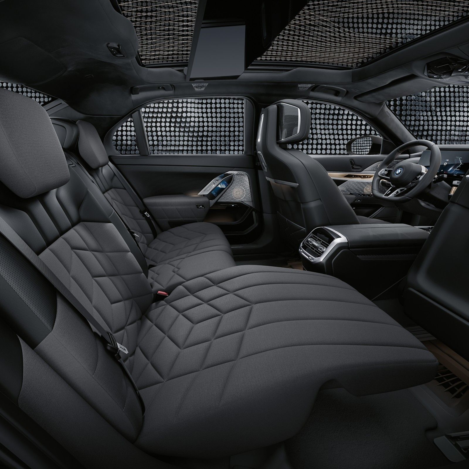 BMW i7 Executive Lounge rear seat reclined with the footrest extended