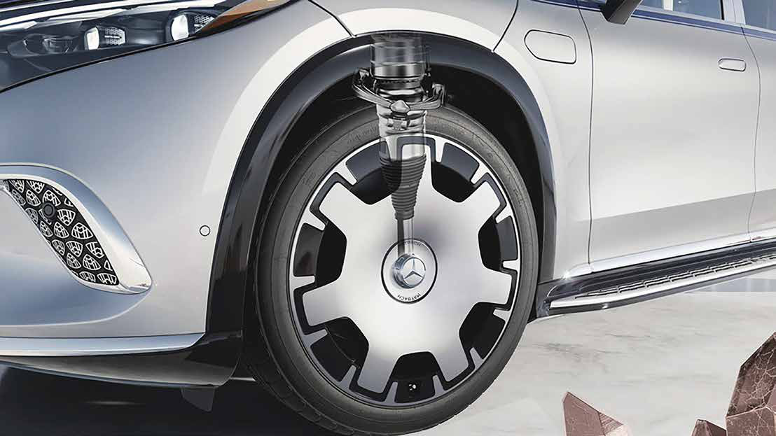 Mercedes-Benz Mercedes-Maybach EQS SUV — AIRMATIC air suspension strut behind the Maybach mono-block wheel