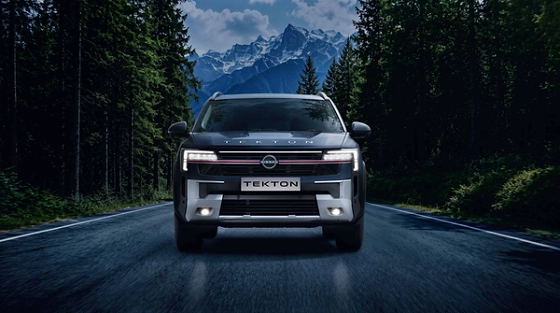 Nissan Tekton, Matrix Vision LED headlamps with signature C-shaped DRLs and a full-width crimson grille accent