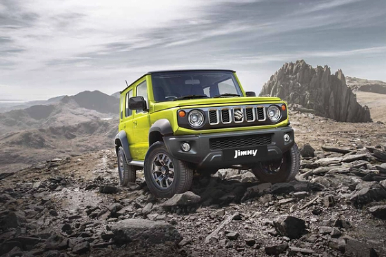 Maruti Suzuki Jimny, Boxy, upright front end with round LED headlamps and the signature five-slot Suzuki grille.