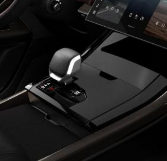 Land Rover Range Rover Sport — Centre-console gear selector with Terrain Response drive-mode controls below the Pivi Pro touchscreen.