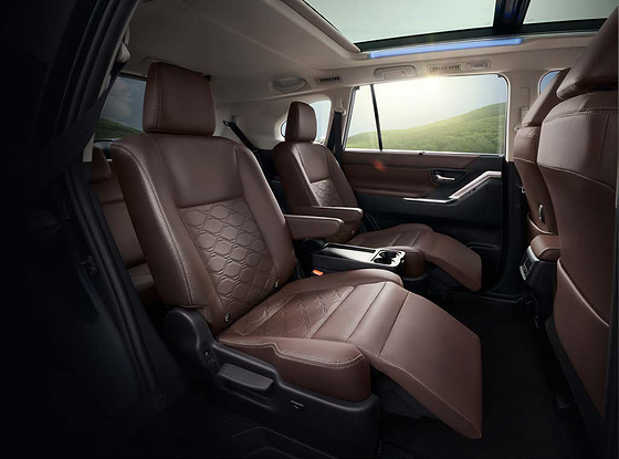 Toyota Innova Hycross, Second-row captain seats with powered ottoman leg support