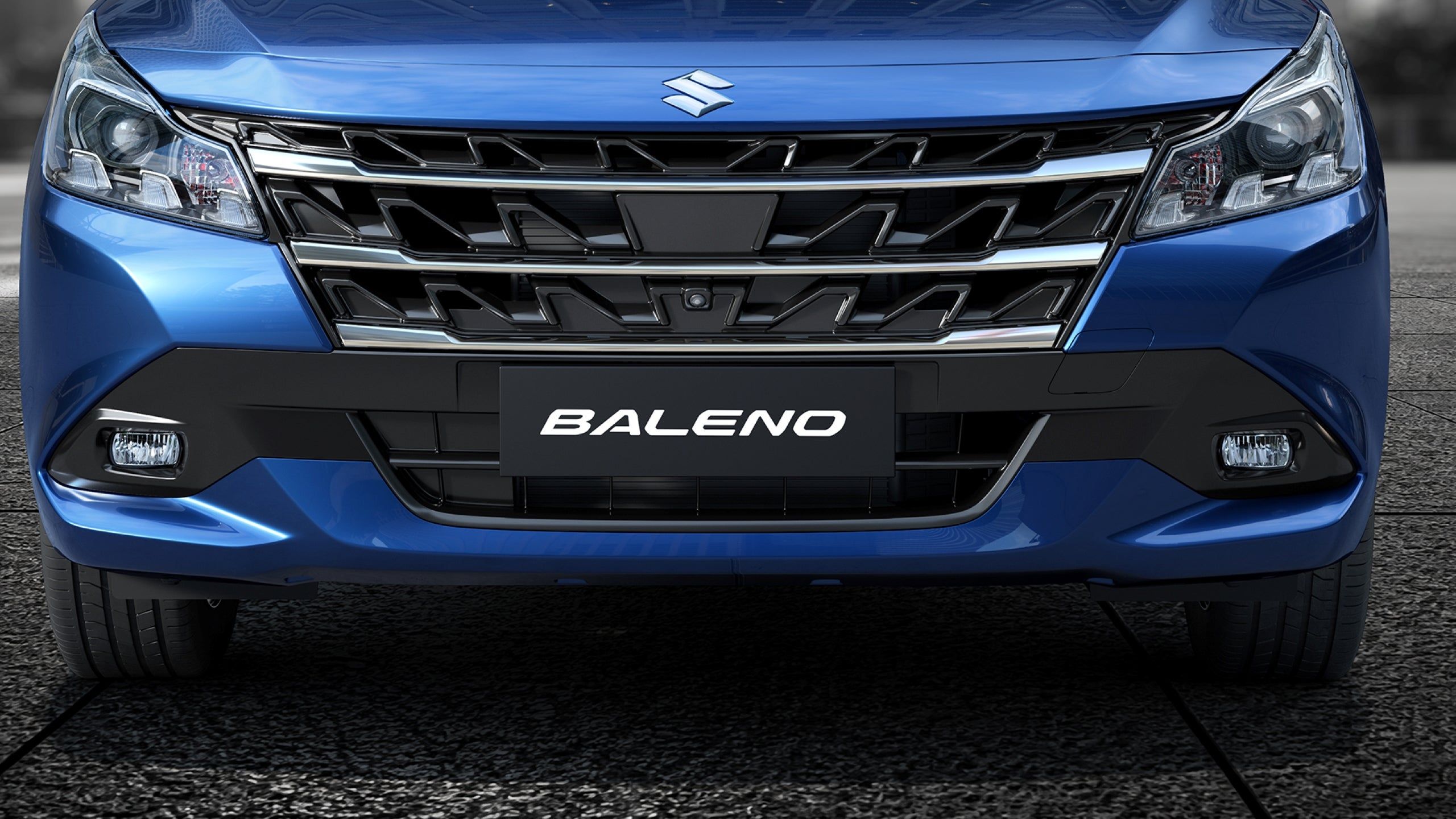 Maruti Suzuki Baleno — Signature NEXWave front grille with LED projector headlamps on Zeta and above (halogen projectors on Sigma and Delta).