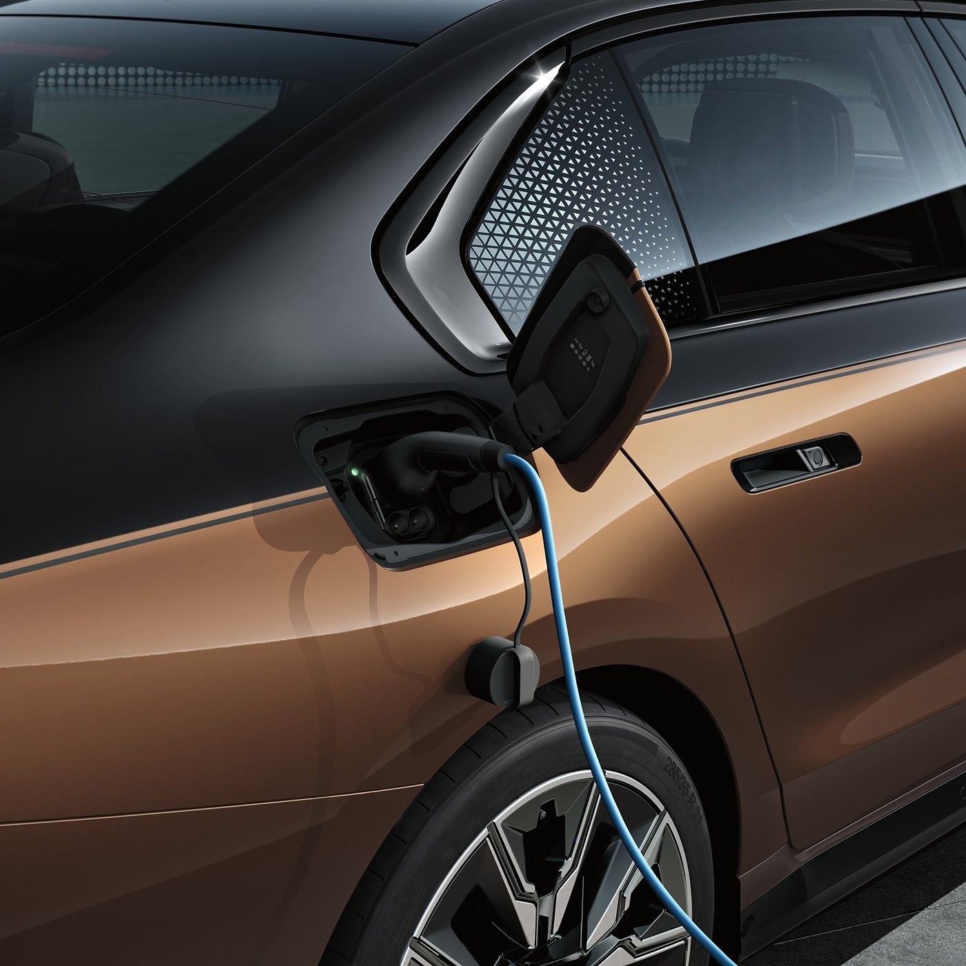 BMW i7 charging port with a CCS2 cable connected