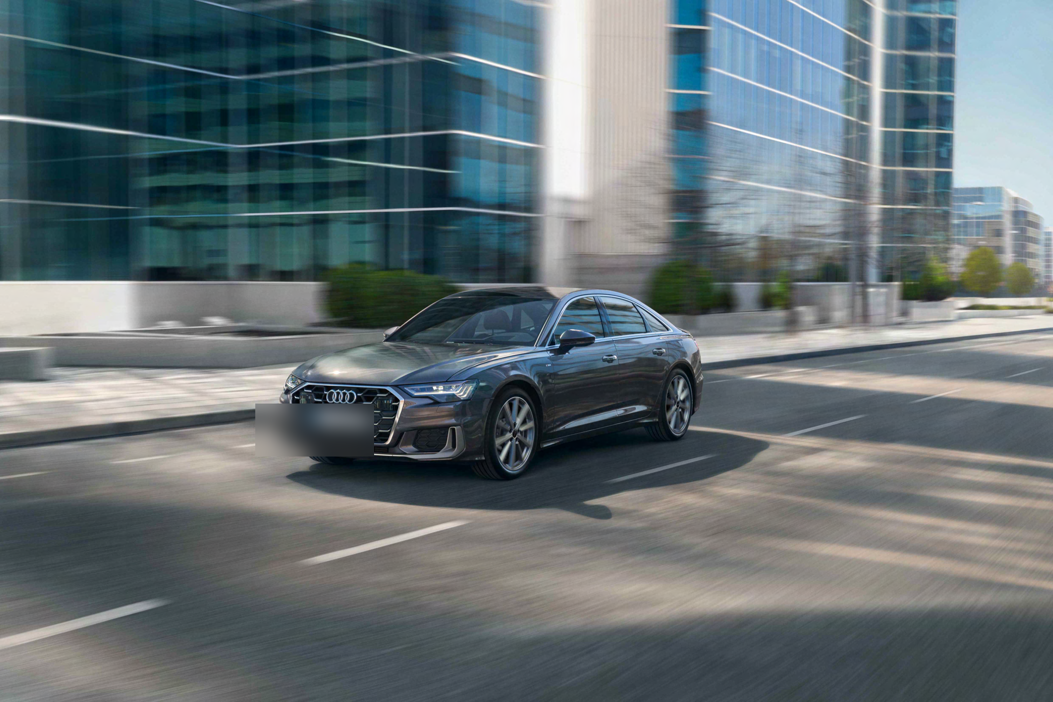 Audi A6 — The Audi A6 in motion, front three-quarter view