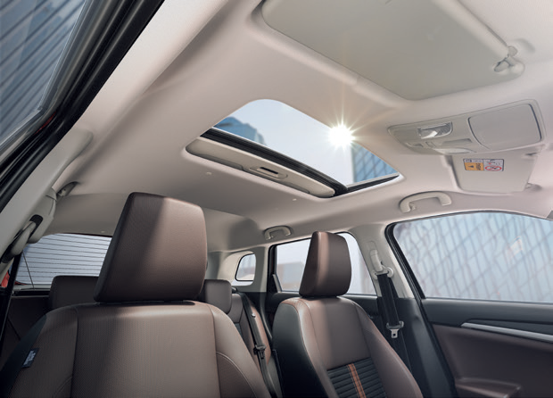 Maruti Suzuki Brezza — Head-up display projecting speed, gear and rpm with turn-by-turn navigation.