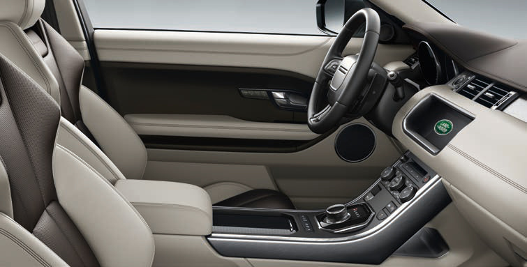 Land Rover Range Rover Evoque — Oyster leather cabin with centre Touchscreen and rotary drive selector.