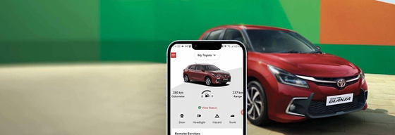 Toyota Glanza (2022-2026), My Toyota connected-car app shows odometer and range with remote door, headlight and hazard controls.