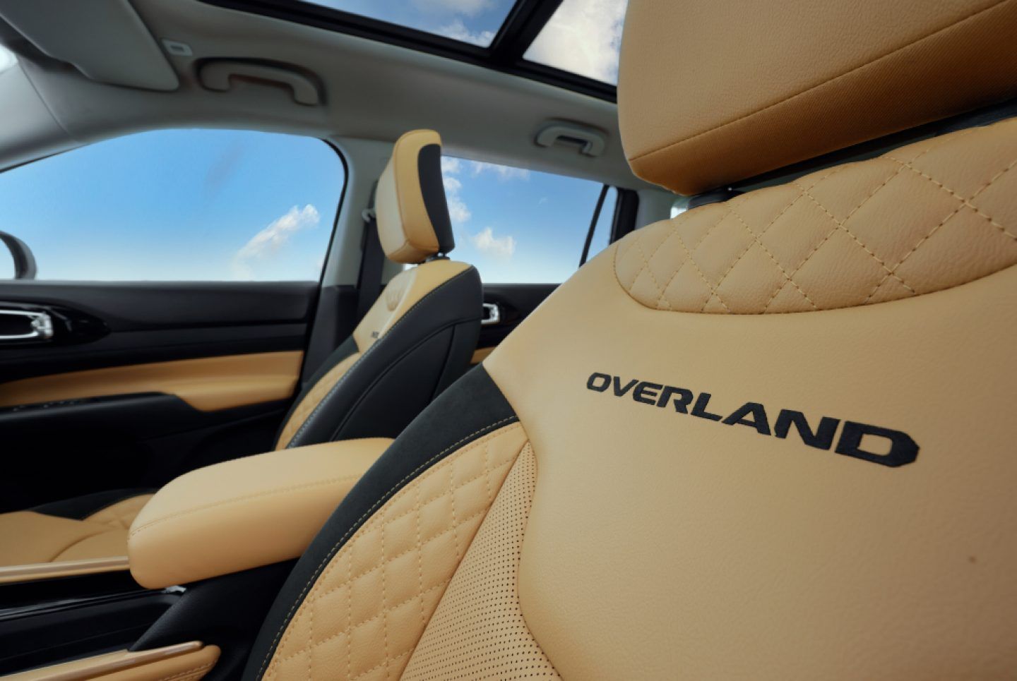 Jeep Meridian — Overland front seats in tan leather with diamond quilting and embossed lettering.