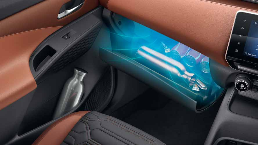 Nissan Magnite — Cooled glove compartment keeping beverages chilled.