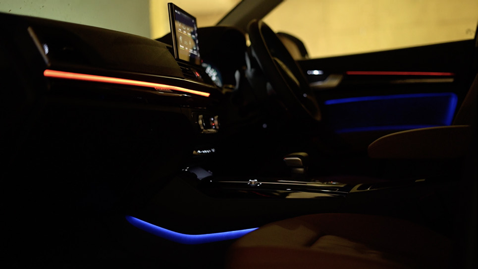 Audi Q5 — Contour ambient lighting with selectable interior colours.
