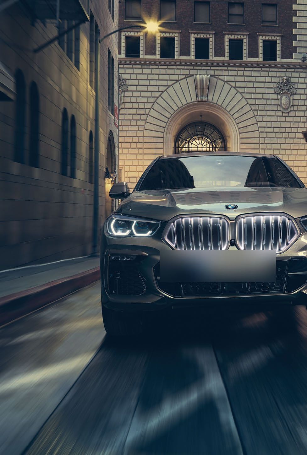 BMW X6 — Illuminated kidney grille leads the coupe-SUV face