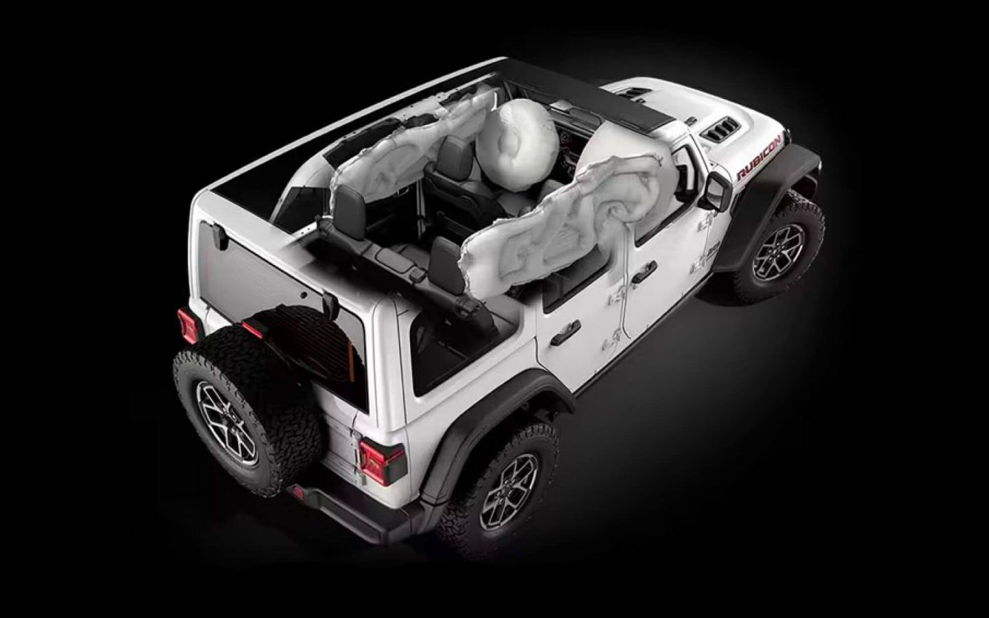 Jeep Wrangler — Cutaway view showing the front and side-curtain airbags deployed