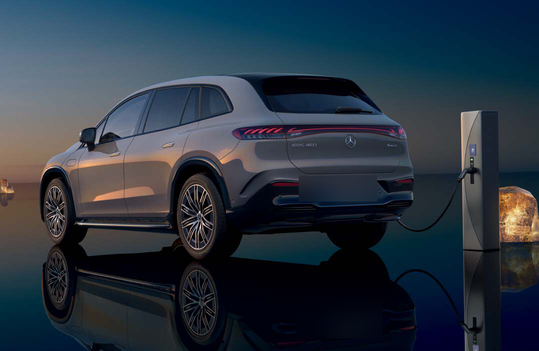 Mercedes-Benz EQS SUV — EQS SUV plugged into a charging station; DC fast charging takes the battery from 10 to 80 percent in about 31 minutes