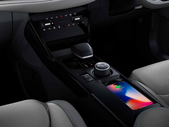 Tata Nexon EV, Grand centre console with drive-mode dial, wireless charging pad and storage