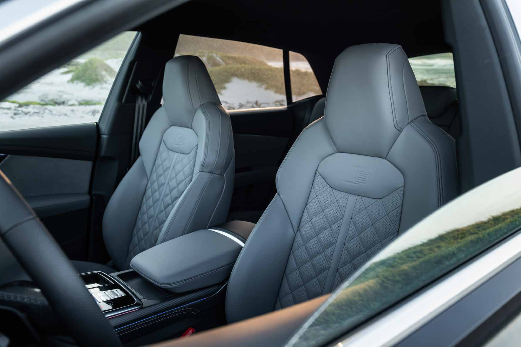 Audi SQ8 — Diamond-stitched leather sport seats with embossed S logo.