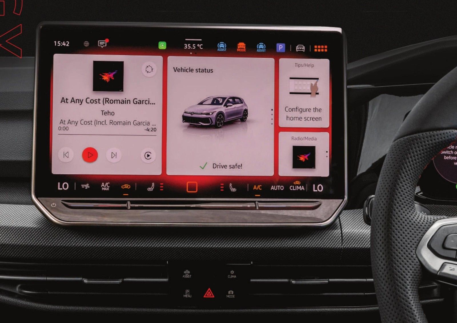 Volkswagen Golf GTI — The large central touchscreen infotainment display showing media and vehicle menus.