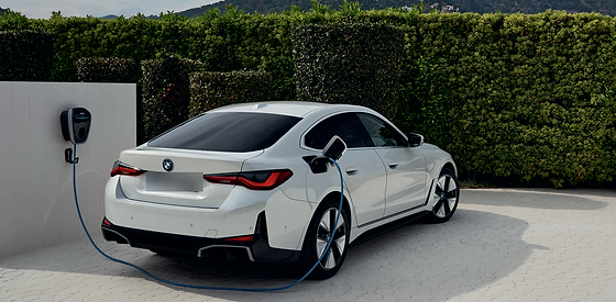 BMW i4, Home AC charging via the wall-mounted BMW Wallbox, delivering up to 11 kW to the i4's side charging port.