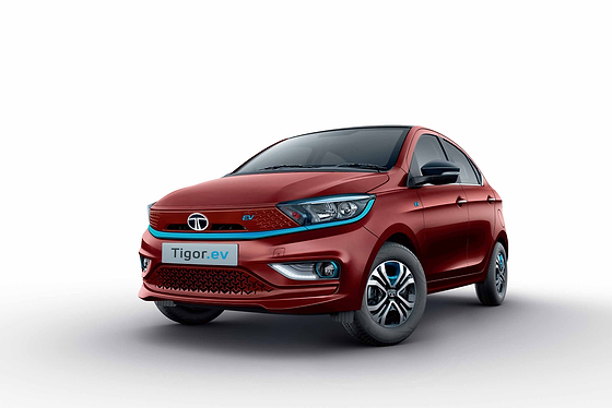 Tata Tigor EV, Dual-tone exterior with piano black contrast roof, closed EV front grille and signature blue accents on the humanity line, fog lamp housings and wheel trims
