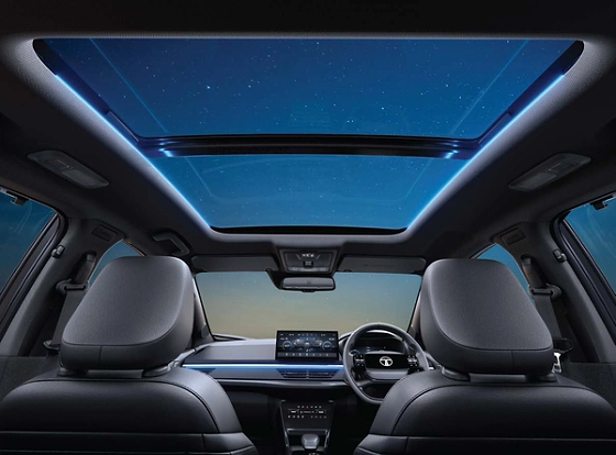 Tata Curvv, Voice-assisted panoramic sunroof with ambient mood lighting around the glass area.