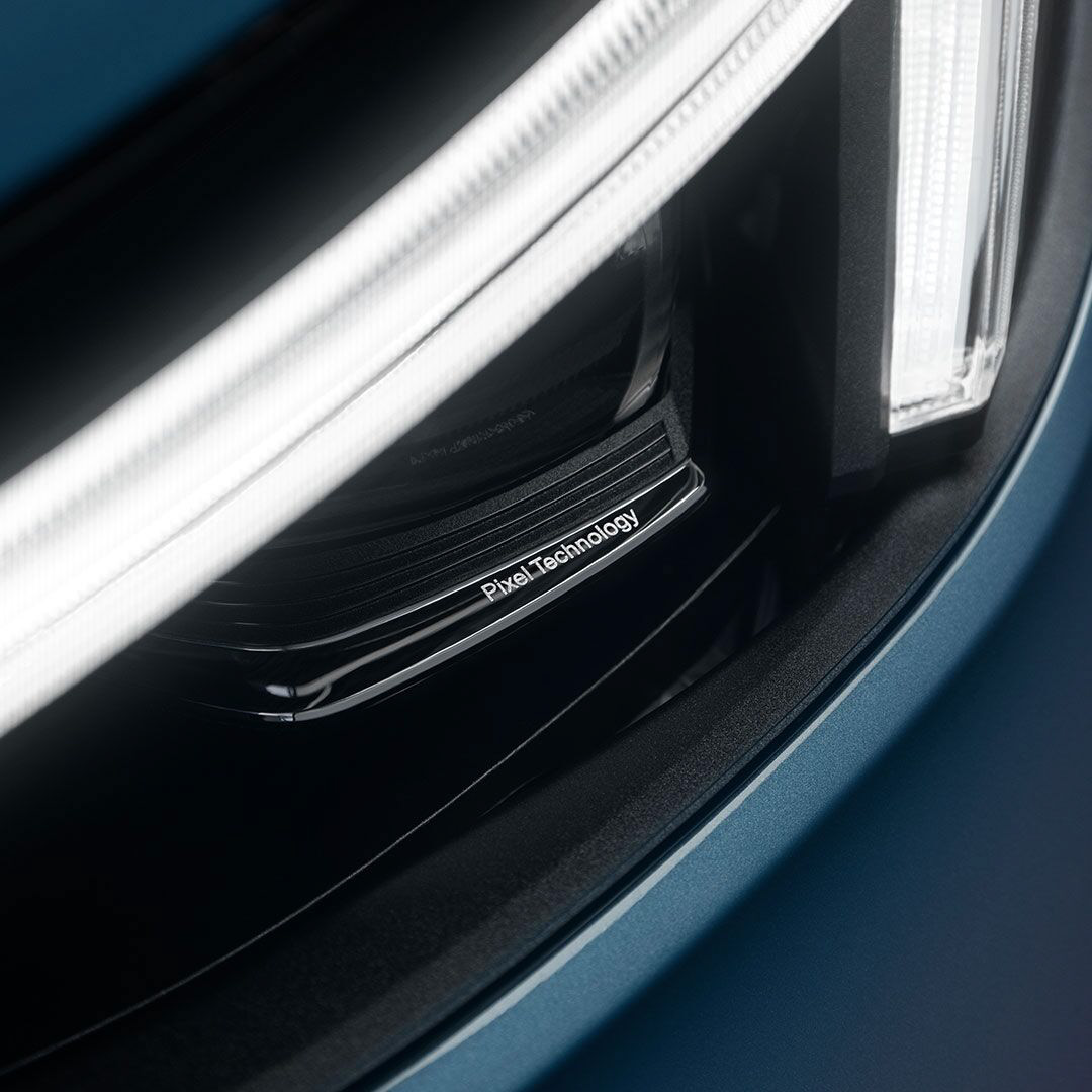 Volvo EC40 — Close-up of the Pixel Technology LED headlight, which provides an adaptive high beam and a wide, bright light pattern.