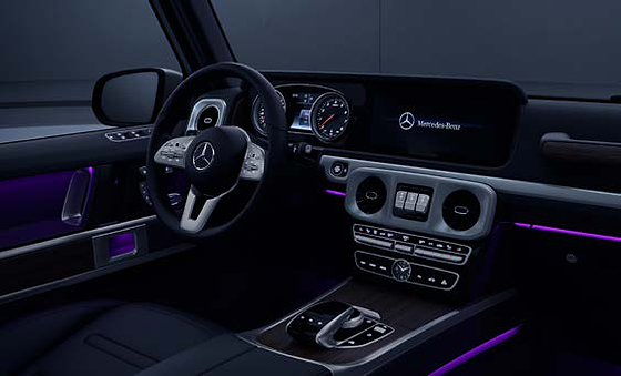 Mercedes-Benz G-Class, Ambient interior lighting bathing the dashboard and door trims in colour, selectable across multiple shades