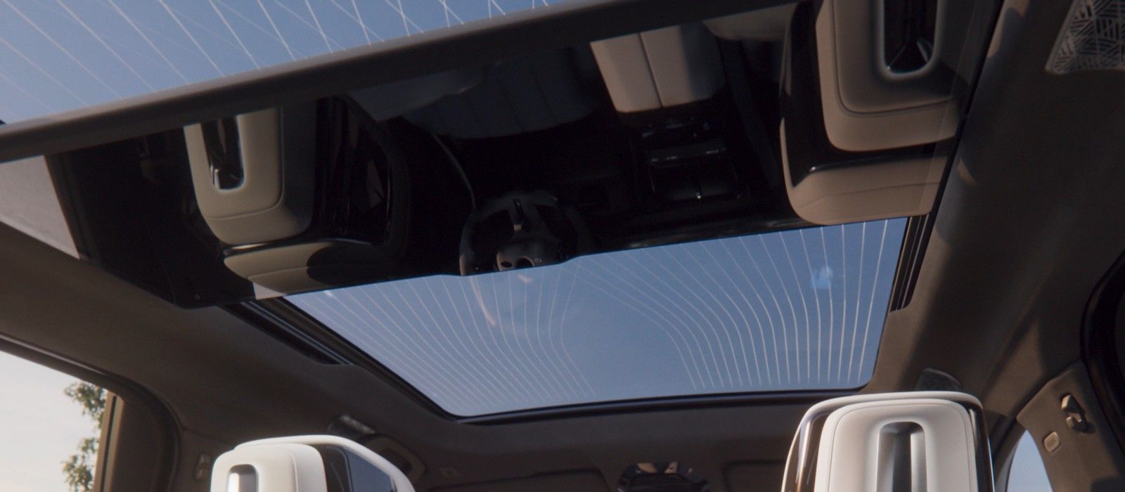 BMW 7 Series — Panoramic Sky Lounge roof with 15,000 light-refracting graphic patterns