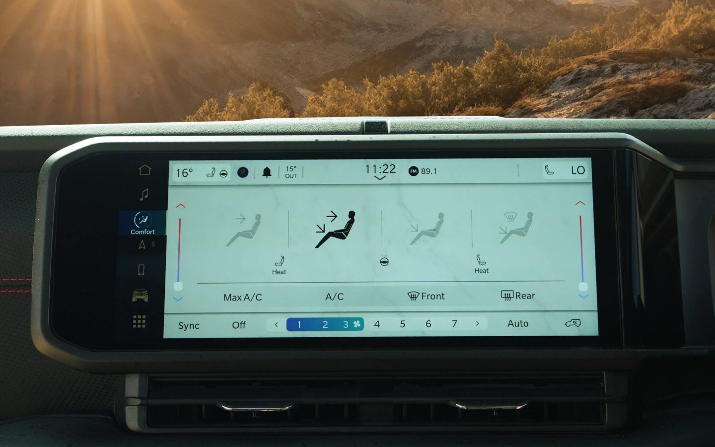 Jeep Wrangler — Touchscreen infotainment display with climate and seat-comfort controls