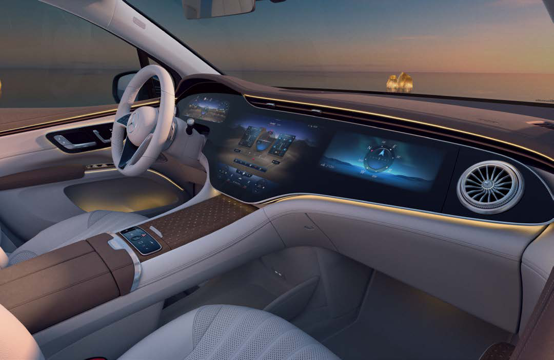 Mercedes-Benz EQS SUV — Dashboard with the curved MBUX Hyperscreen and 64-colour ambient lighting running across the cabin