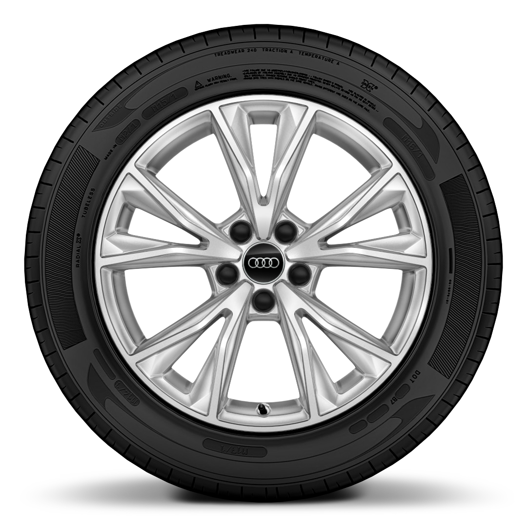 Audi Q3 — Machined-finish alloy wheel shod with a low-profile tyre.