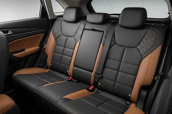 Maruti Suzuki Brezza, Plush leatherette upholstery in a dual-tone brown and black finish.