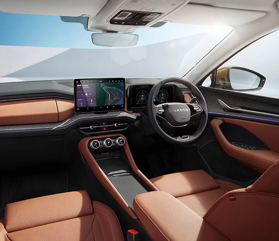 Skoda Kodiaq, Free-standing central touchscreen and digital cockpit in a cognac-leather cabin