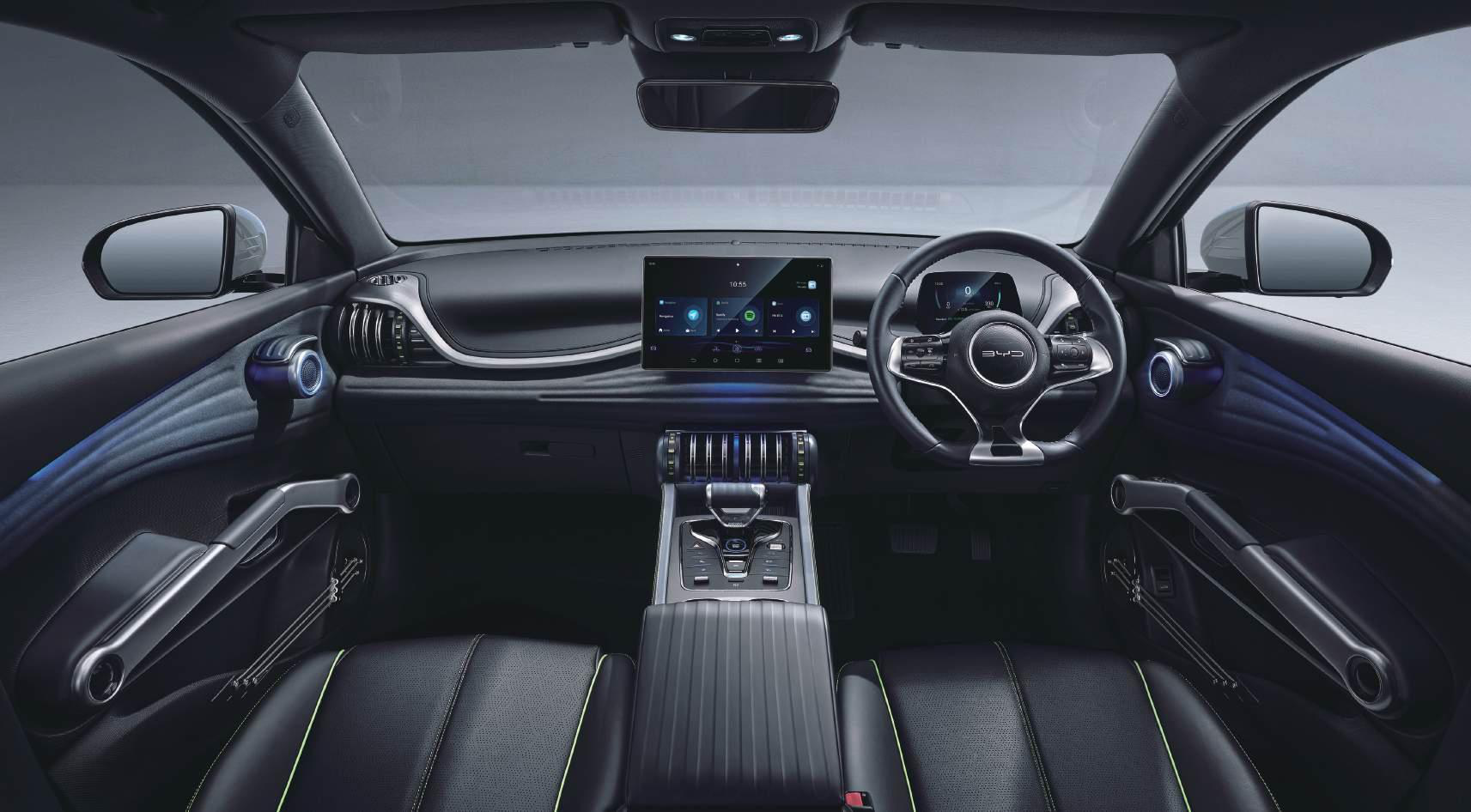 BYD Atto 3 — Driver-focused cabin with a floating rotating central touchscreen and digital instrument display