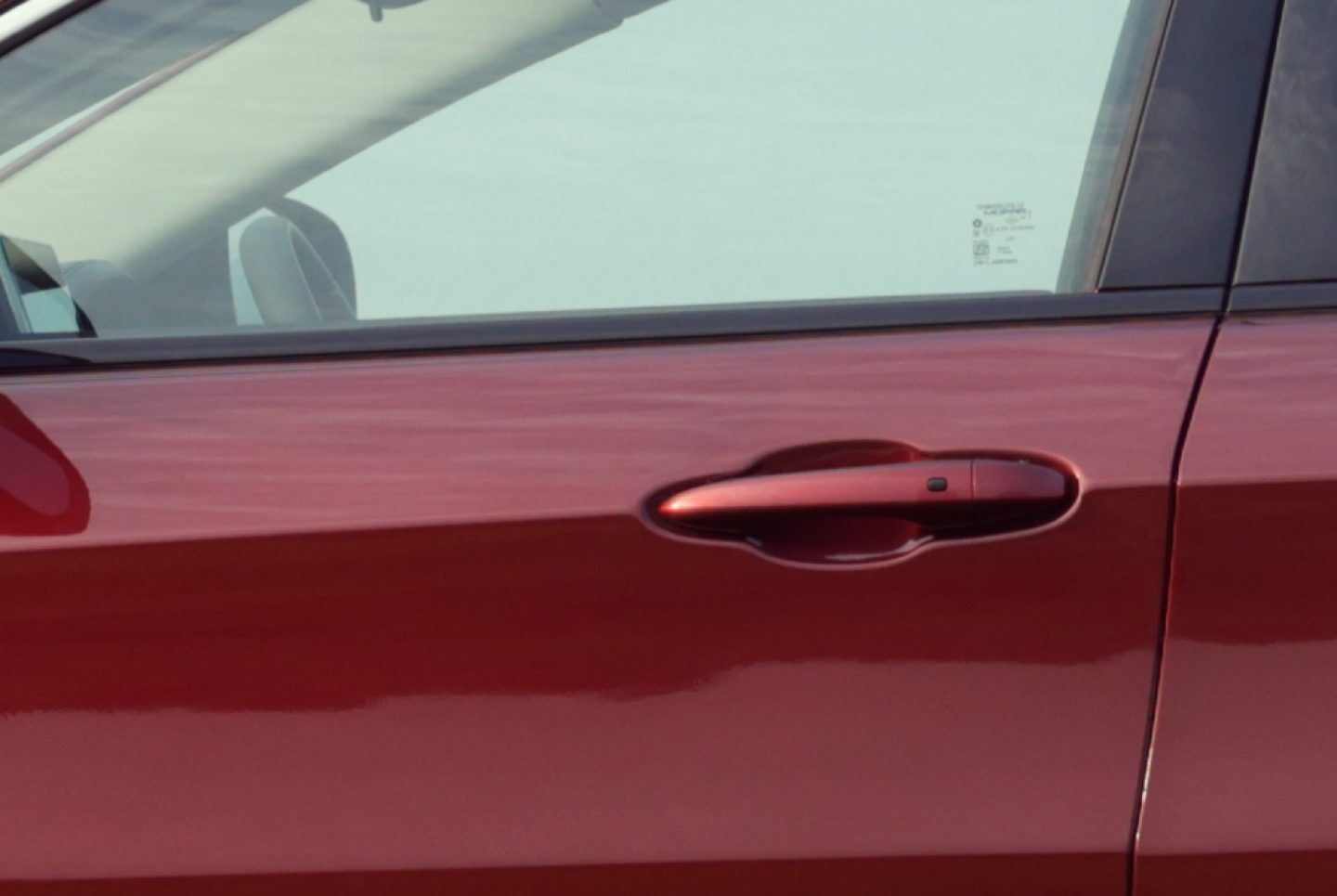 Jeep Meridian — Flush front-door handle with a request sensor for keyless entry.