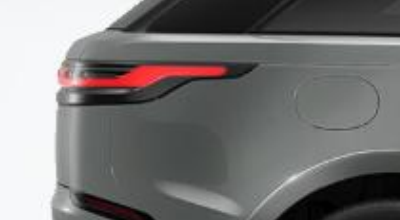 Land Rover Range Rover Velar — Slim full-width LED tail-light signature.