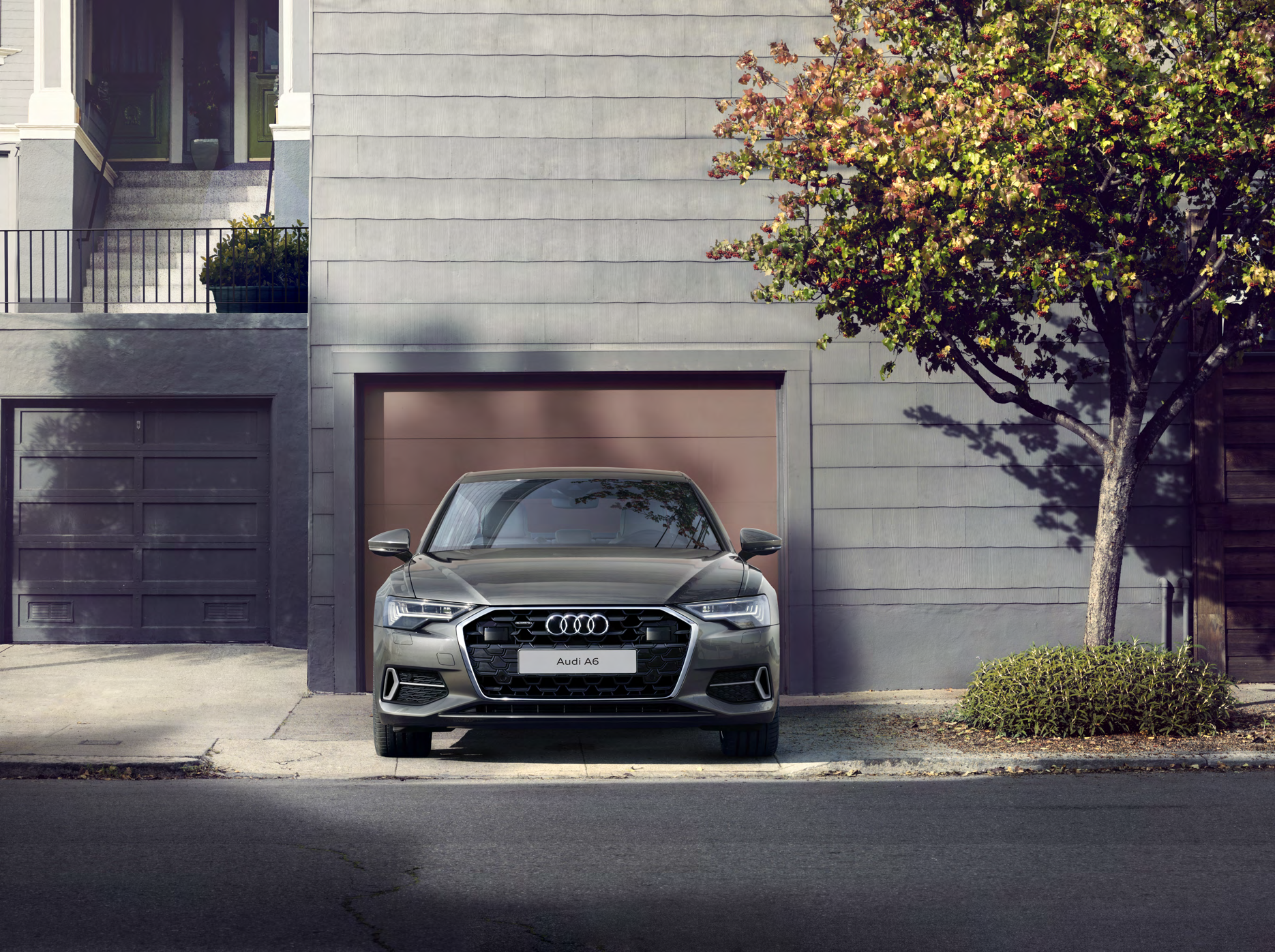 Audi A6 — Wide singleframe grille flanked by LED headlights on the Audi A6 front