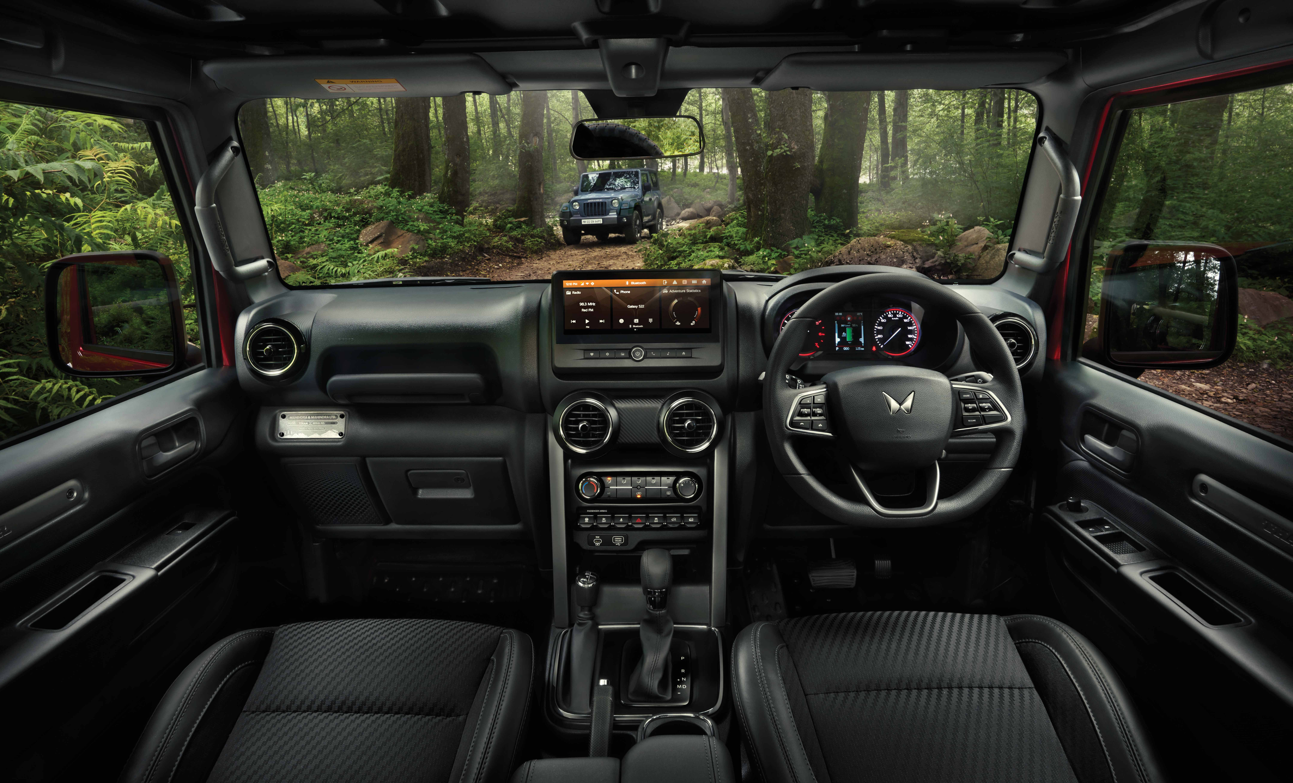 Mahindra Thar — Dashboard with 26.03 cm HD touchscreen infotainment and analogue-plus-TFT instrument cluster