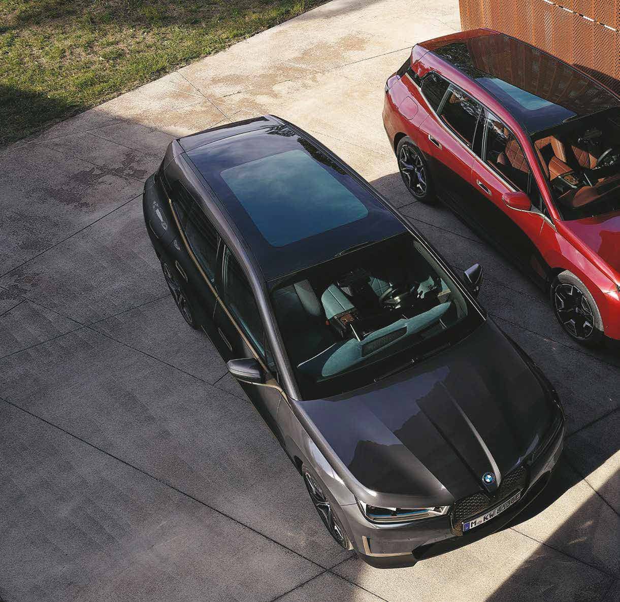 BMW iX — Panoramic roof over a spacious cabin