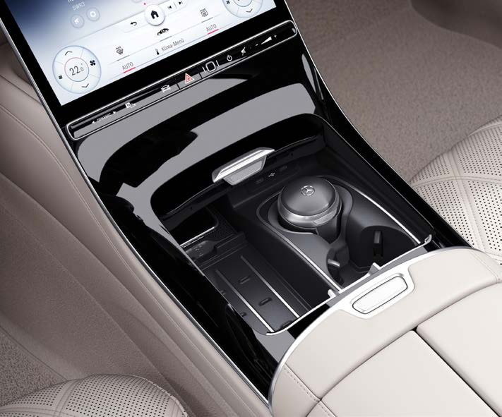 Mercedes-Benz Mercedes-Maybach S-Class — Wireless smartphone charging pad integrated into the front centre console.
