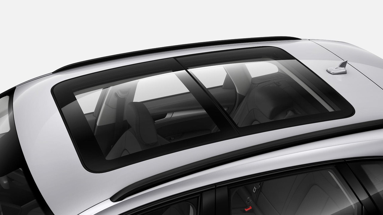 Audi Q5 — Two-part panoramic glass sunroof spanning the roofline.