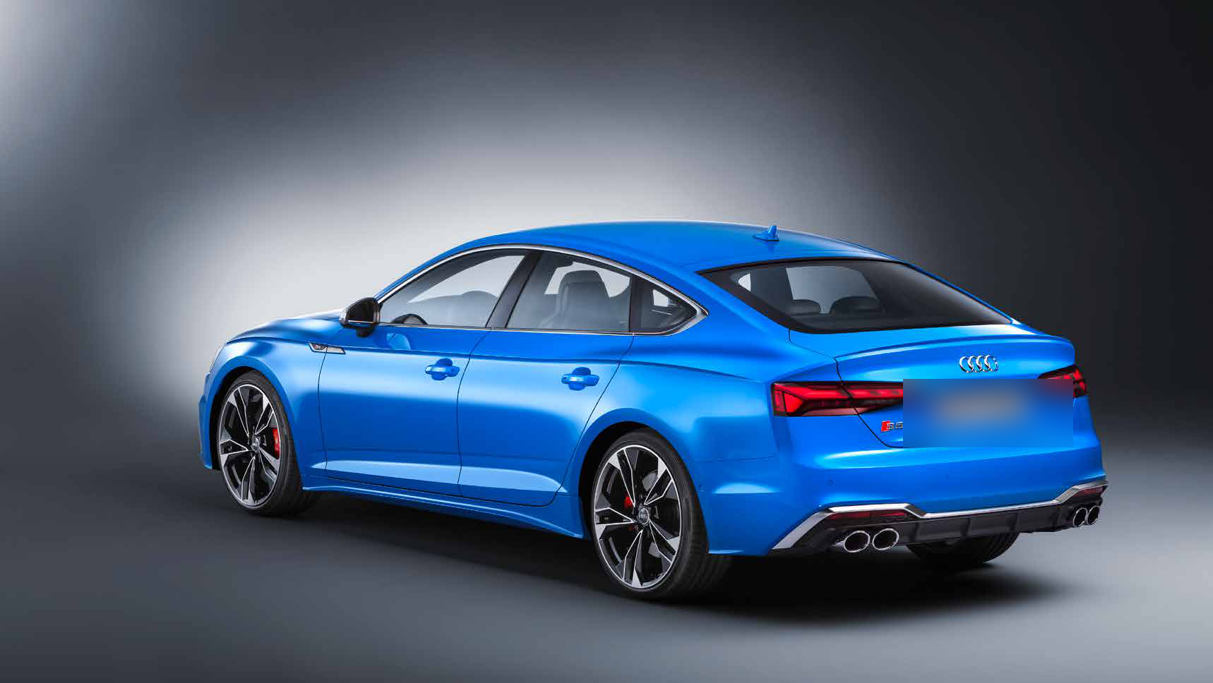 Audi S5 Sportback — Coupe-like rear with slim LED tail lights and the sloping Sportback roofline