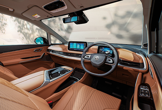 MG M9, Twin-screen dashboard with central touchscreen infotainment and digital driver display.