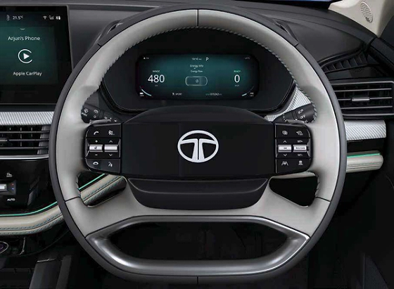Tata Harrier EV, Smart digital steering wheel puts seamless controls at your fingertips, framing the 26.03 cm digital cockpit display