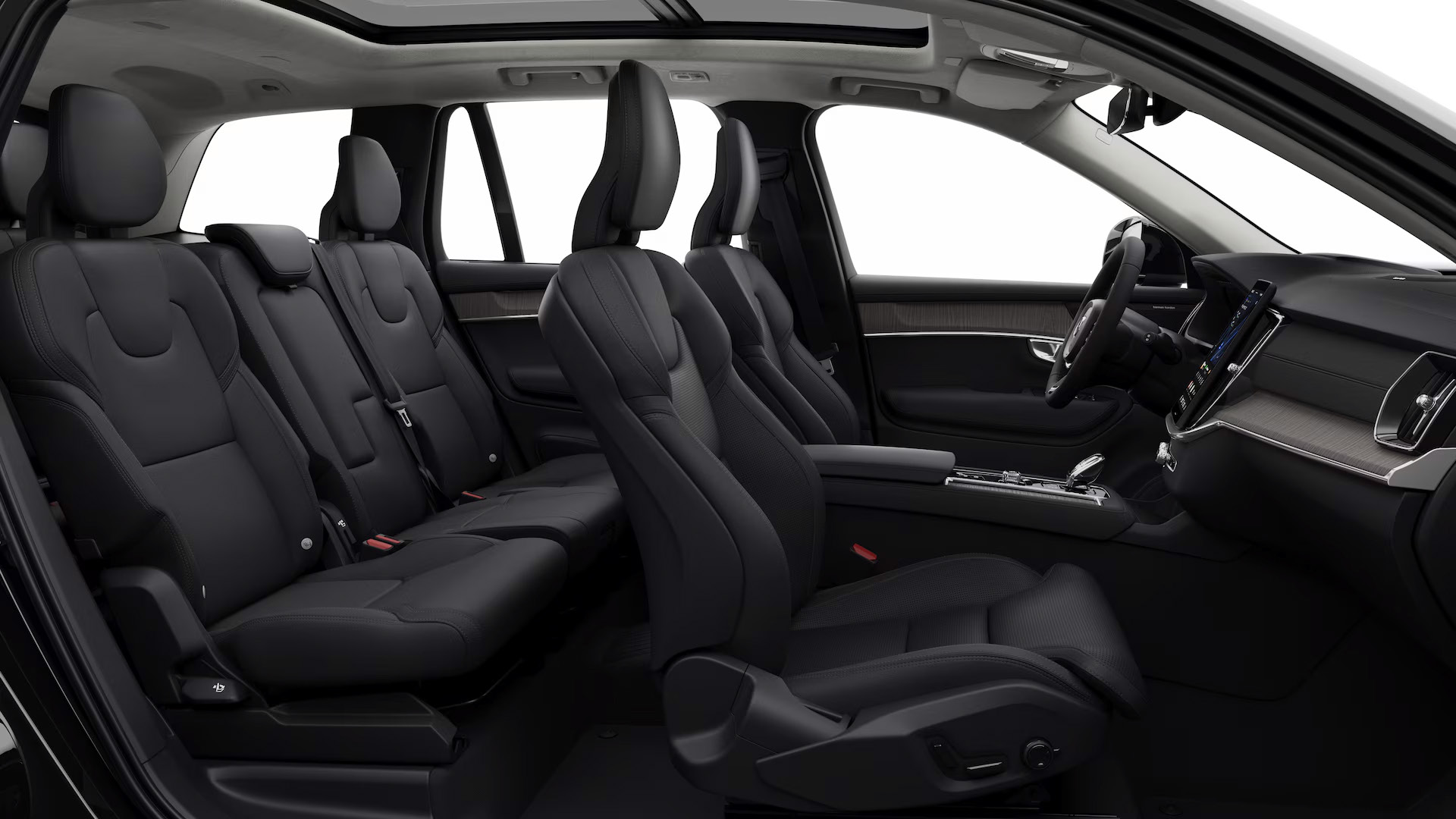 Volvo XC90 — Seven-seat three-row cabin trimmed in charcoal leather