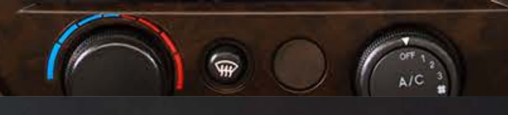 Mahindra Bolero — Manual rotary climate control with heater/demister and A/C dial