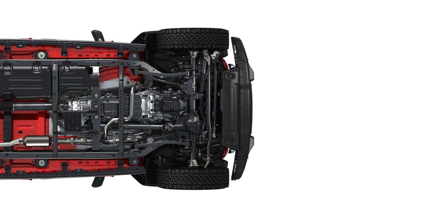 Jeep Wrangler — Underbody steel skid plates protecting the transfer case, fuel tank and transmission